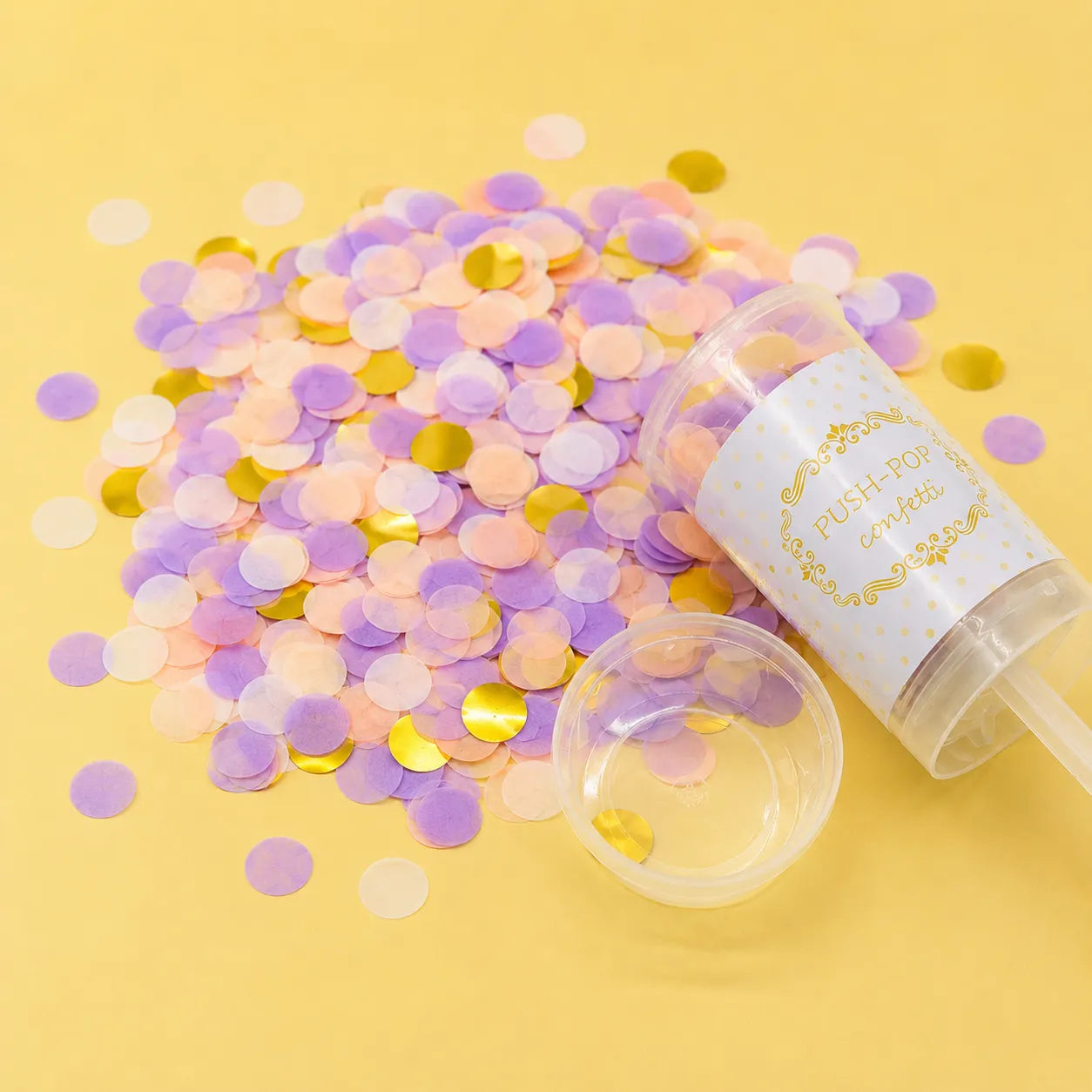 canon à confettis violets et dorés